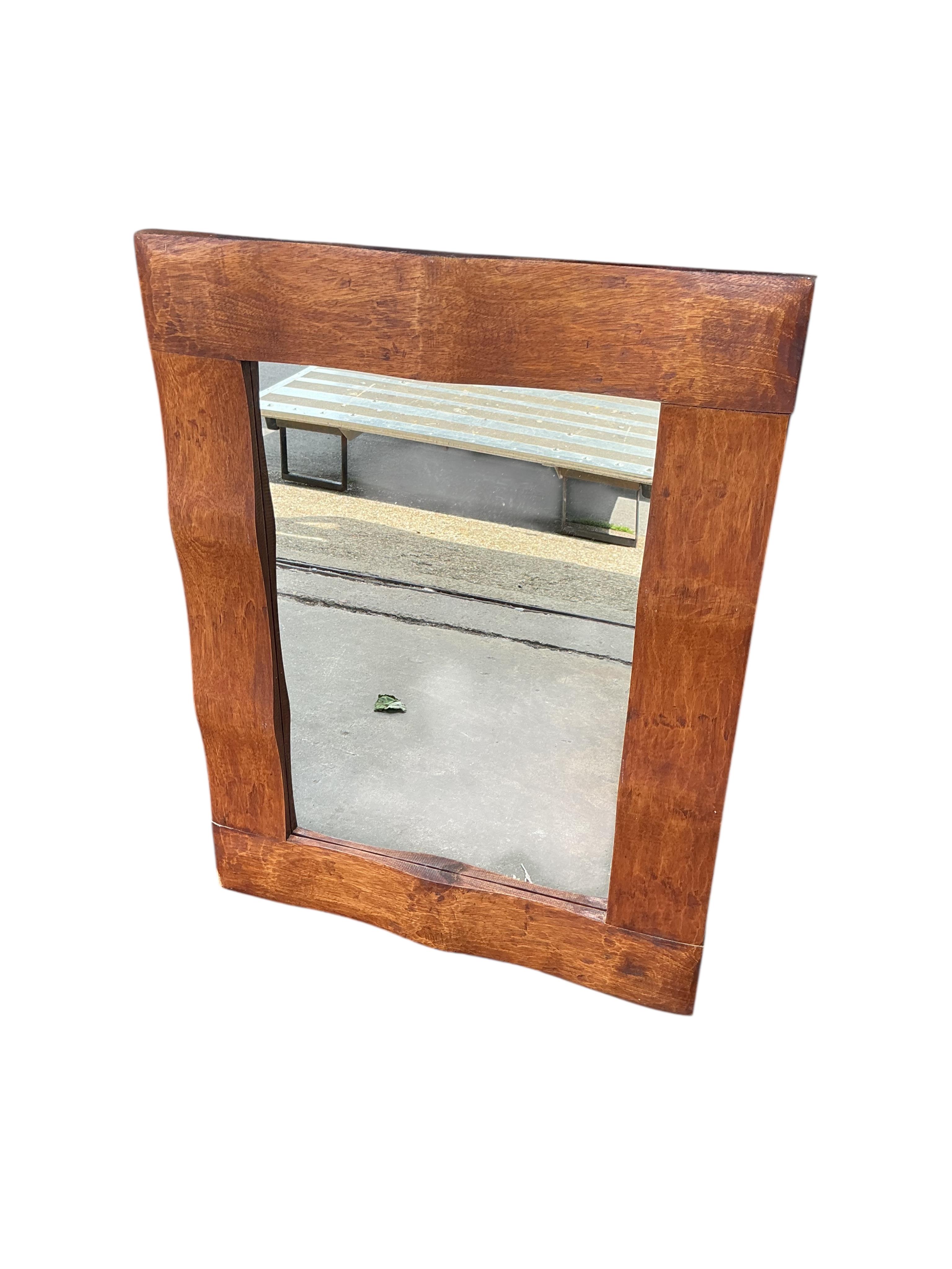 Three modern wall mirrors, of which two with hardwood frames and one carved and painted white, largest width 64cm, height 84cm